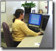 Receptionist viewing in/out board